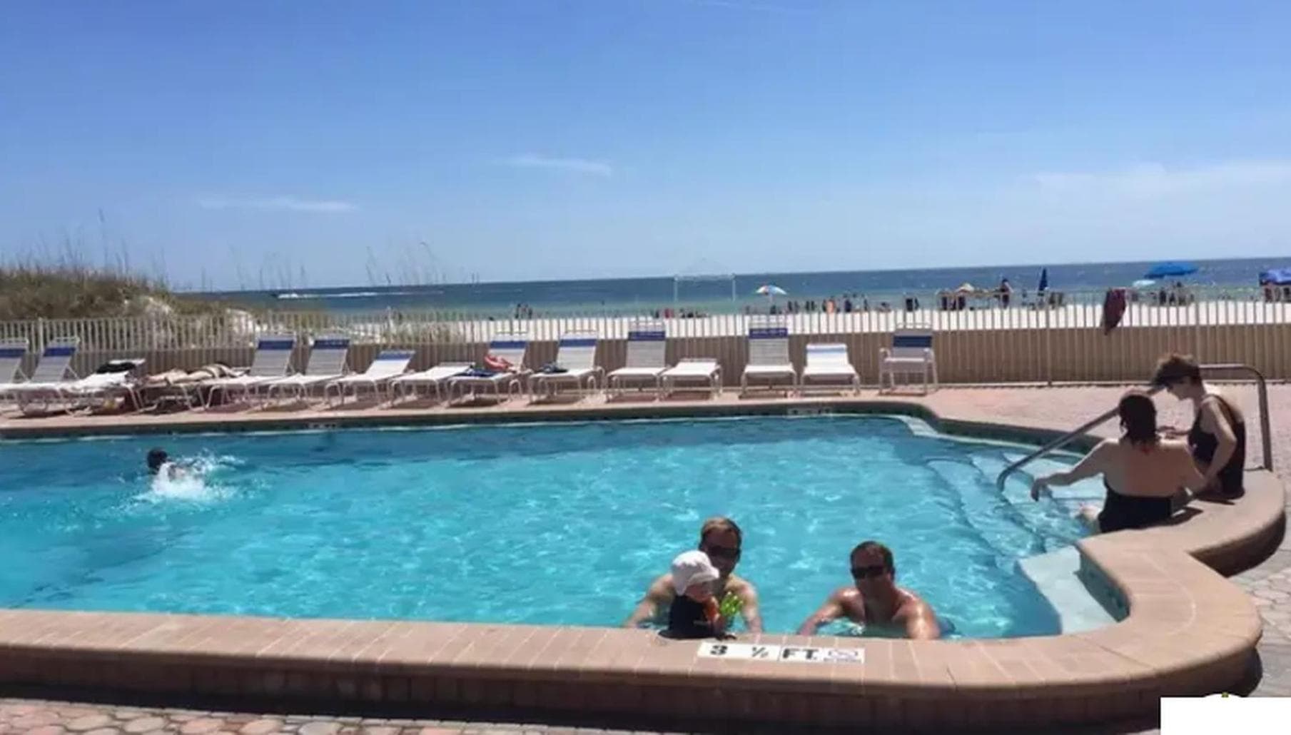 Holiday Villas III #311 pool close from 8AM-4PM until MAY Monday-Friday property views in Clearwater Beach, FL — gallery photo 3