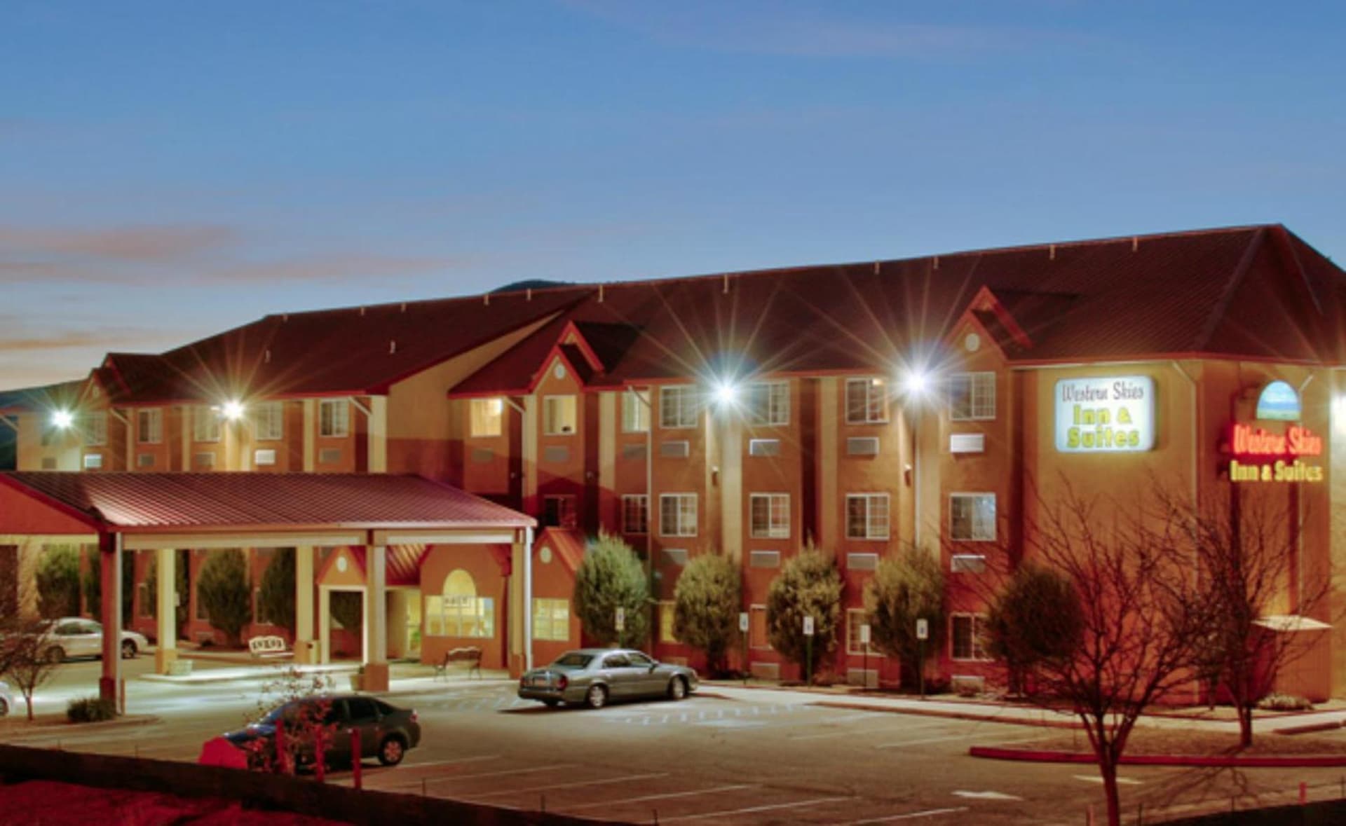 Western Skies Inn & Suites featured exterior or lobby in Los Lunas, NM — similar hotel