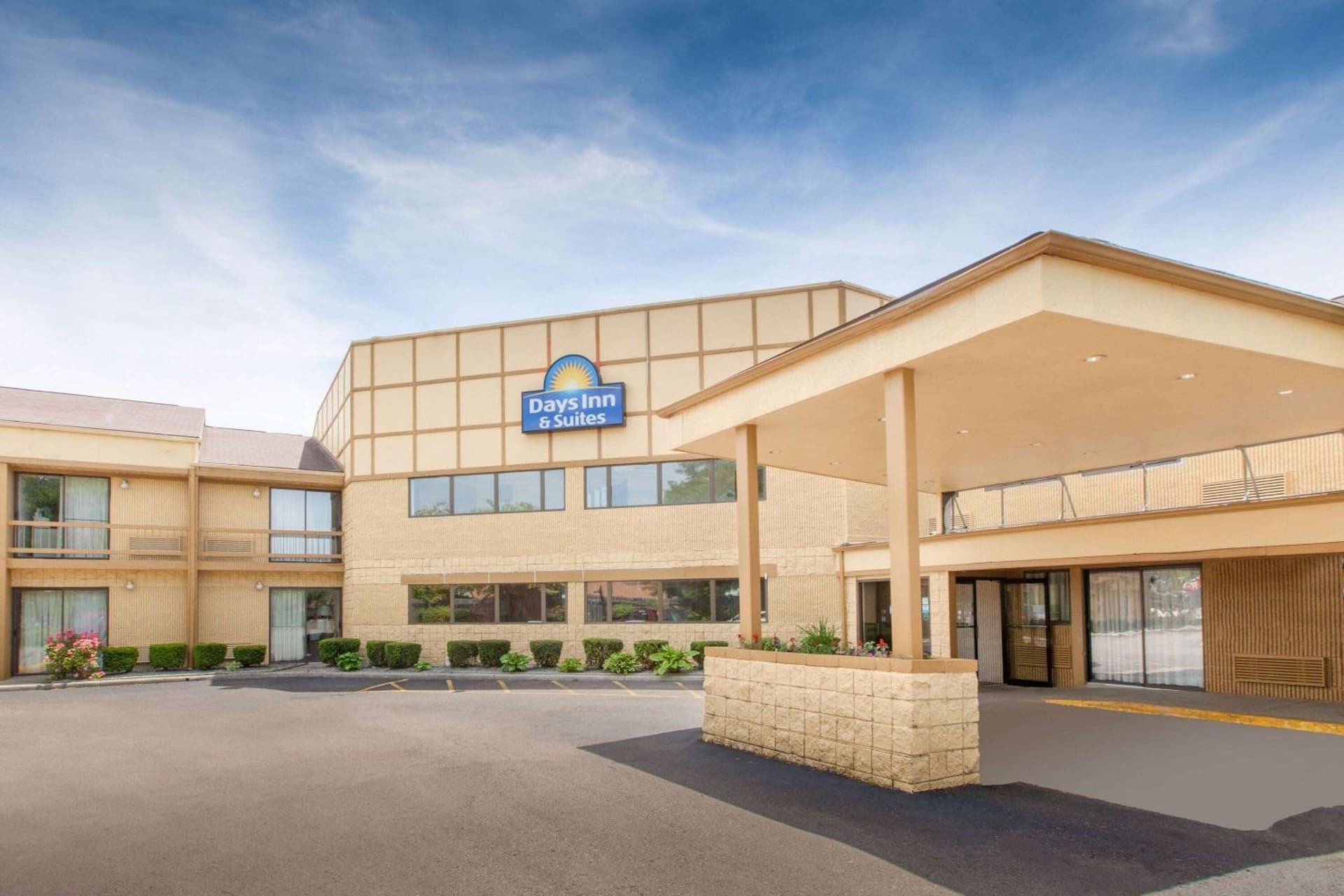 Days Inn & Suites by Wyndham Madison Heights MI featured exterior or lobby in Madison Heights, MI — similar hotel