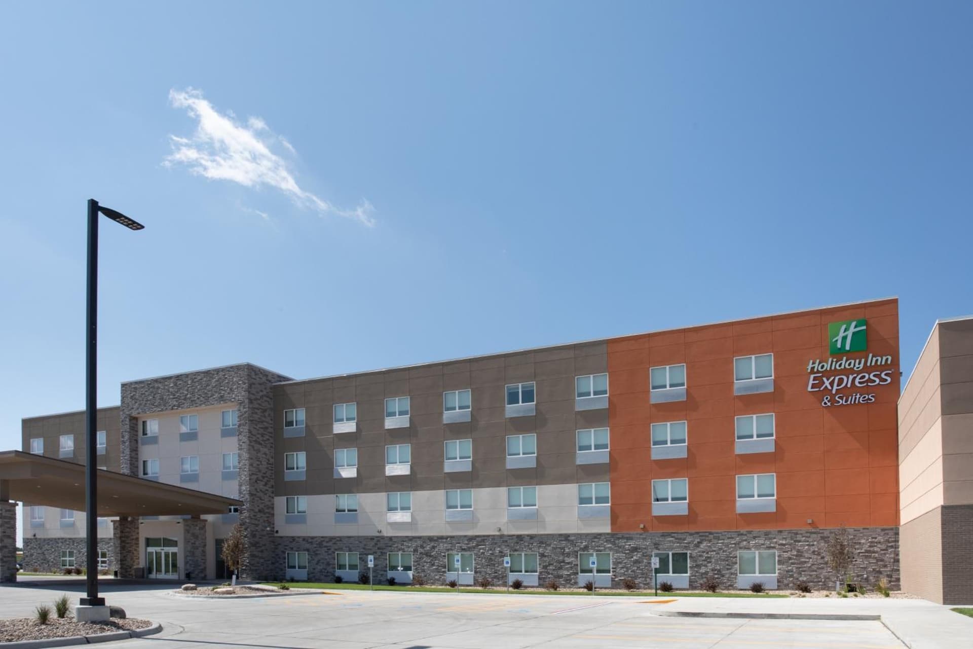 Holiday Inn Express & Suites Sioux City North - Event Center by IHG featured exterior or lobby in Dakota Dunes, SD — similar hotel