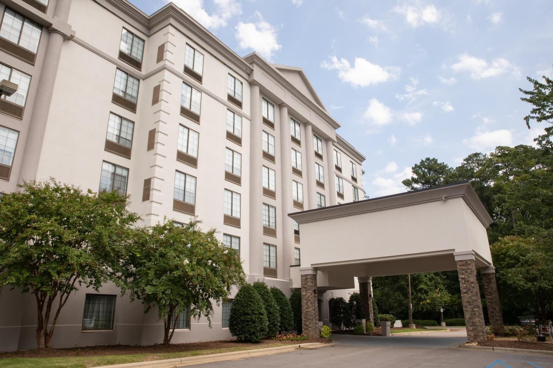 Holiday Inn Hotel & Suites Raleigh / Cary by IHG exterior or lobby in Cary, NC — main listing photo