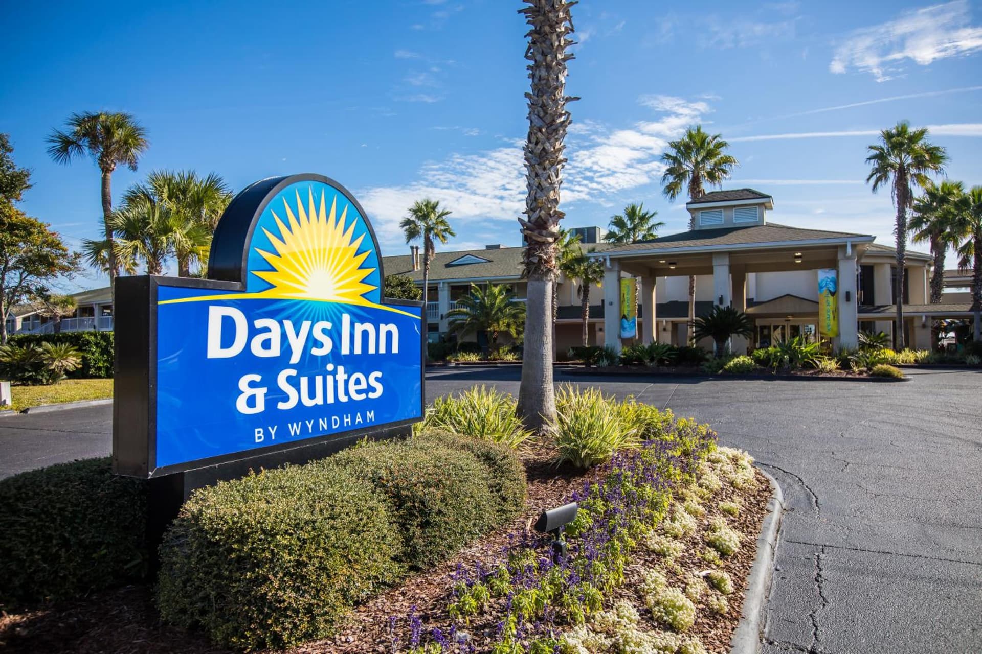 Days Inn & Suites by Wyndham Jekyll Island featured exterior or lobby in Jekyll Island, GA — similar hotel