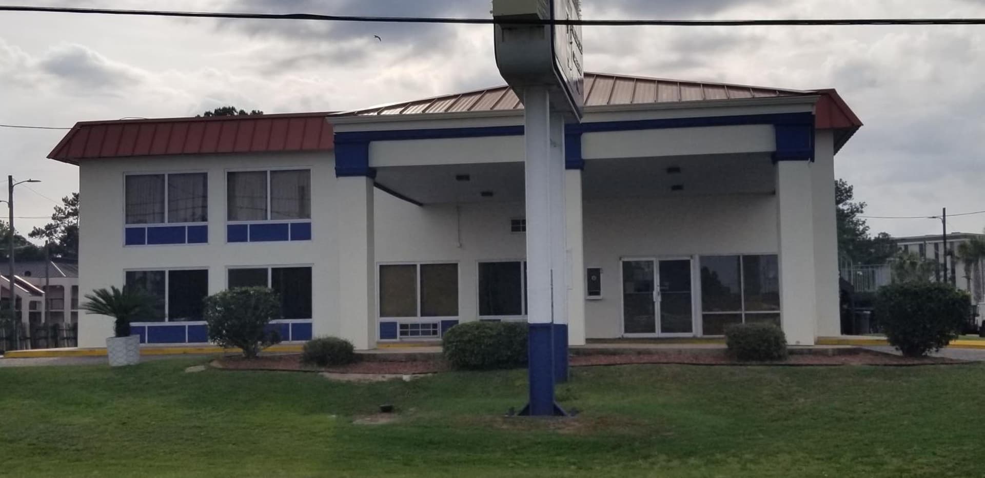 Family Inns of America - Mobile exterior or lobby in Mobile, AL — main listing photo