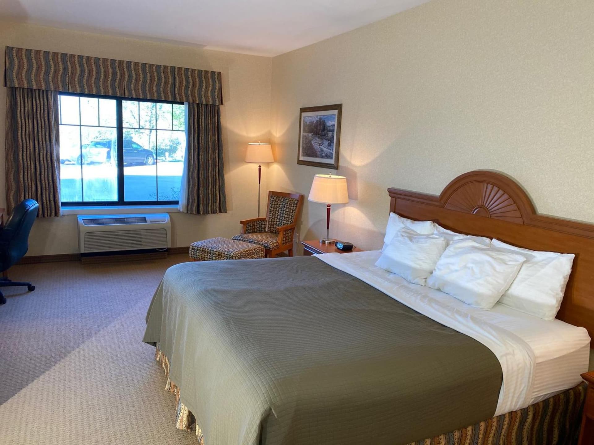 Red Coach Inn & Suites featured exterior or lobby in Red Oak, IA — similar hotel