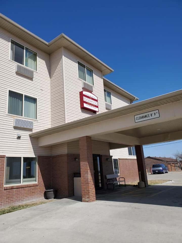 The Edgewood Hotel and Suites featured exterior or lobby in Fairbury, NE — similar hotel