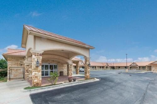 Eagle Ford Inn featured exterior or lobby in Floresville, TX — similar hotel