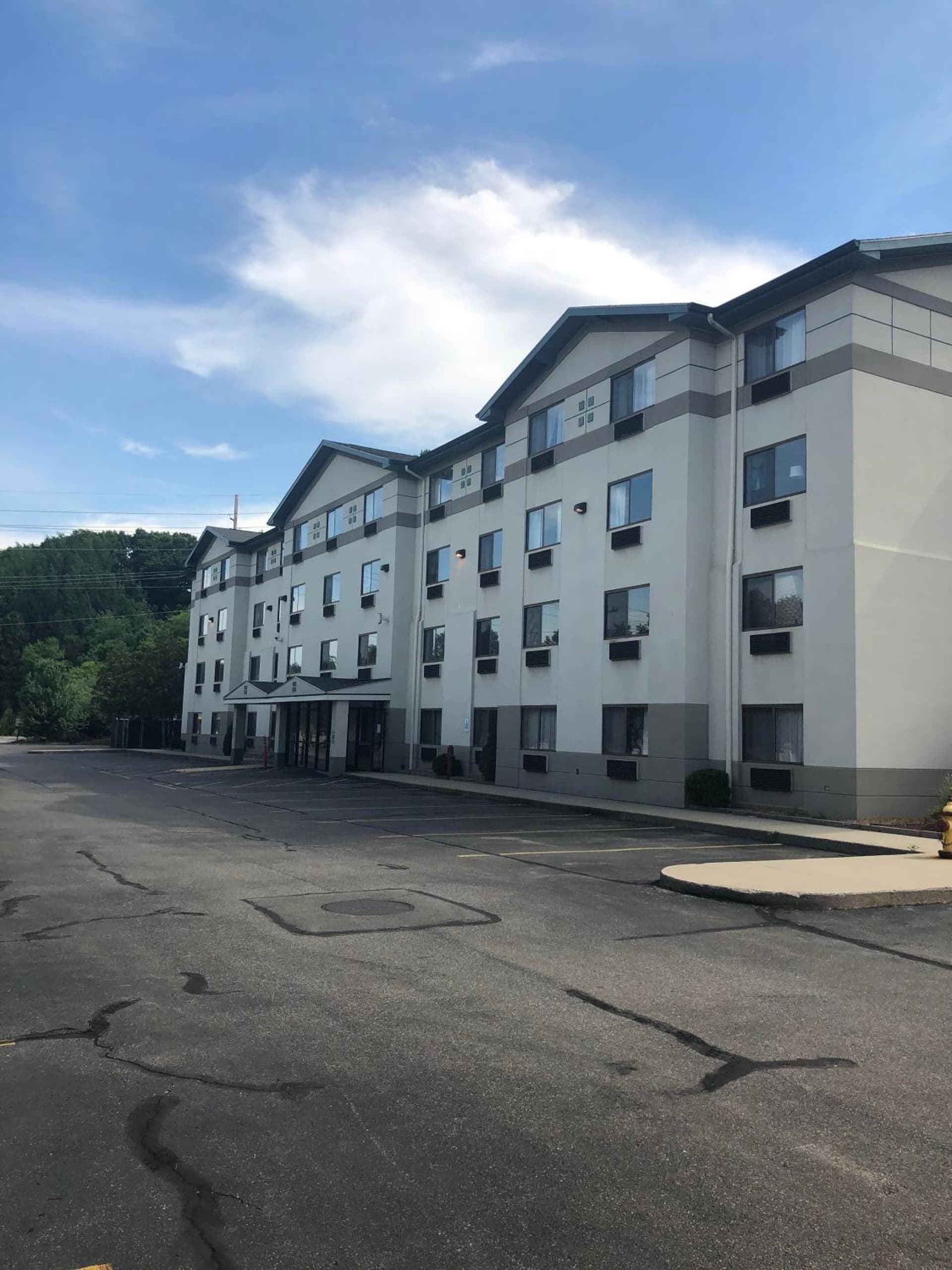 Super 8 by Wyndham Manchester Airport exterior or lobby in Manchester, NH — main listing photo