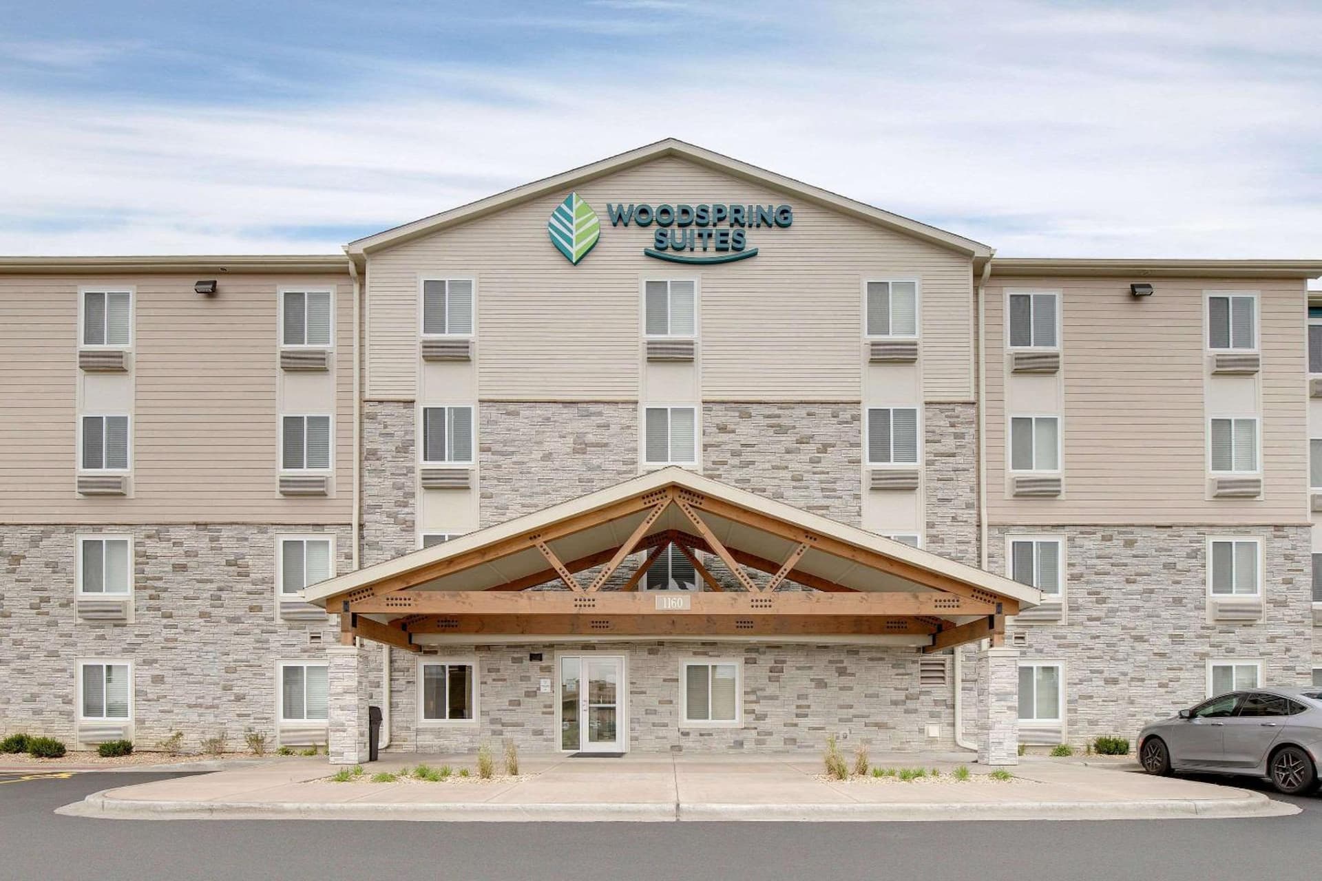 WoodSpring Suites Carol Stream - Chicago featured exterior or lobby in Carol Stream, IL — similar hotel