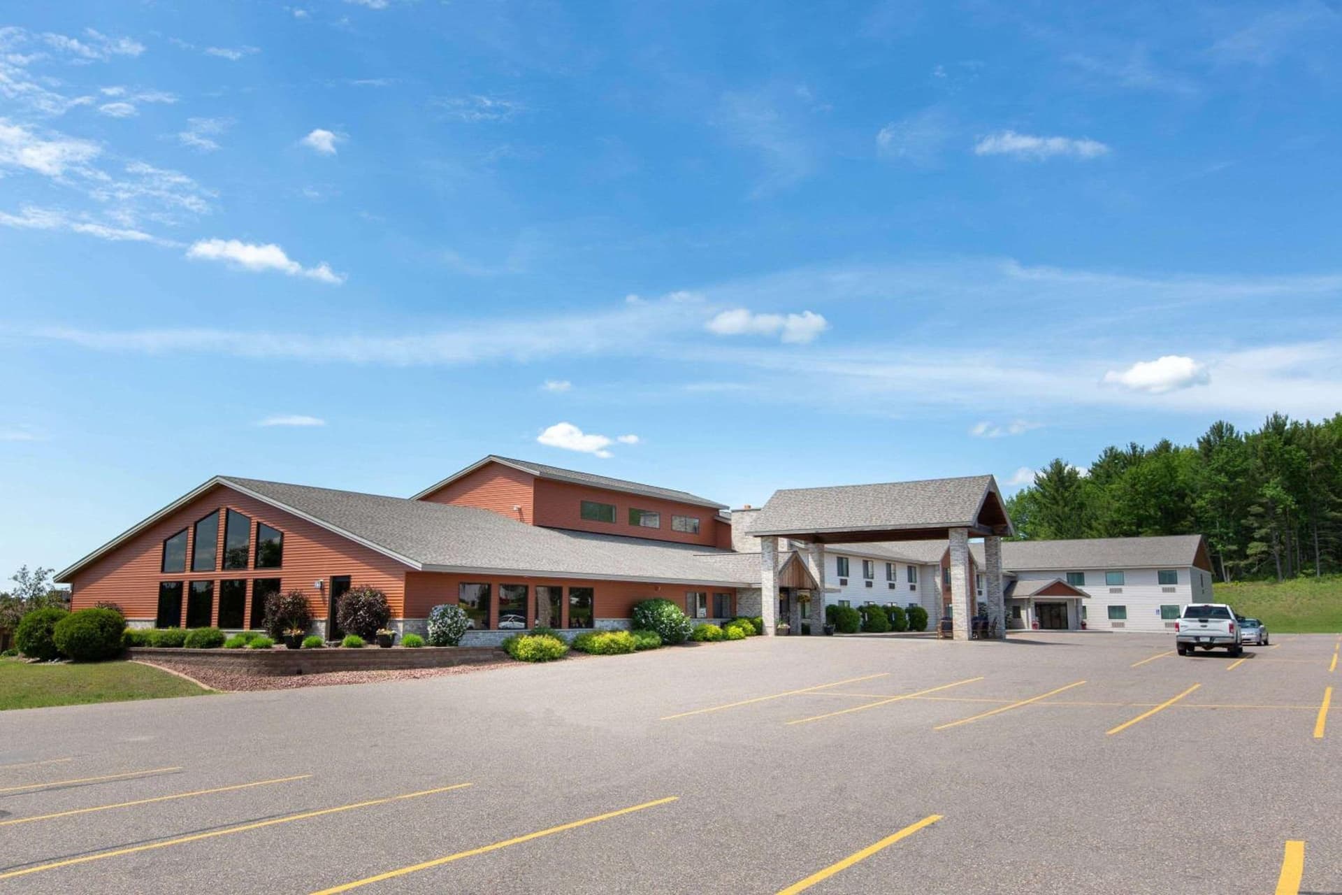 AmericInn by Wyndham Merrill featured exterior or lobby in Merrill, WI — similar hotel