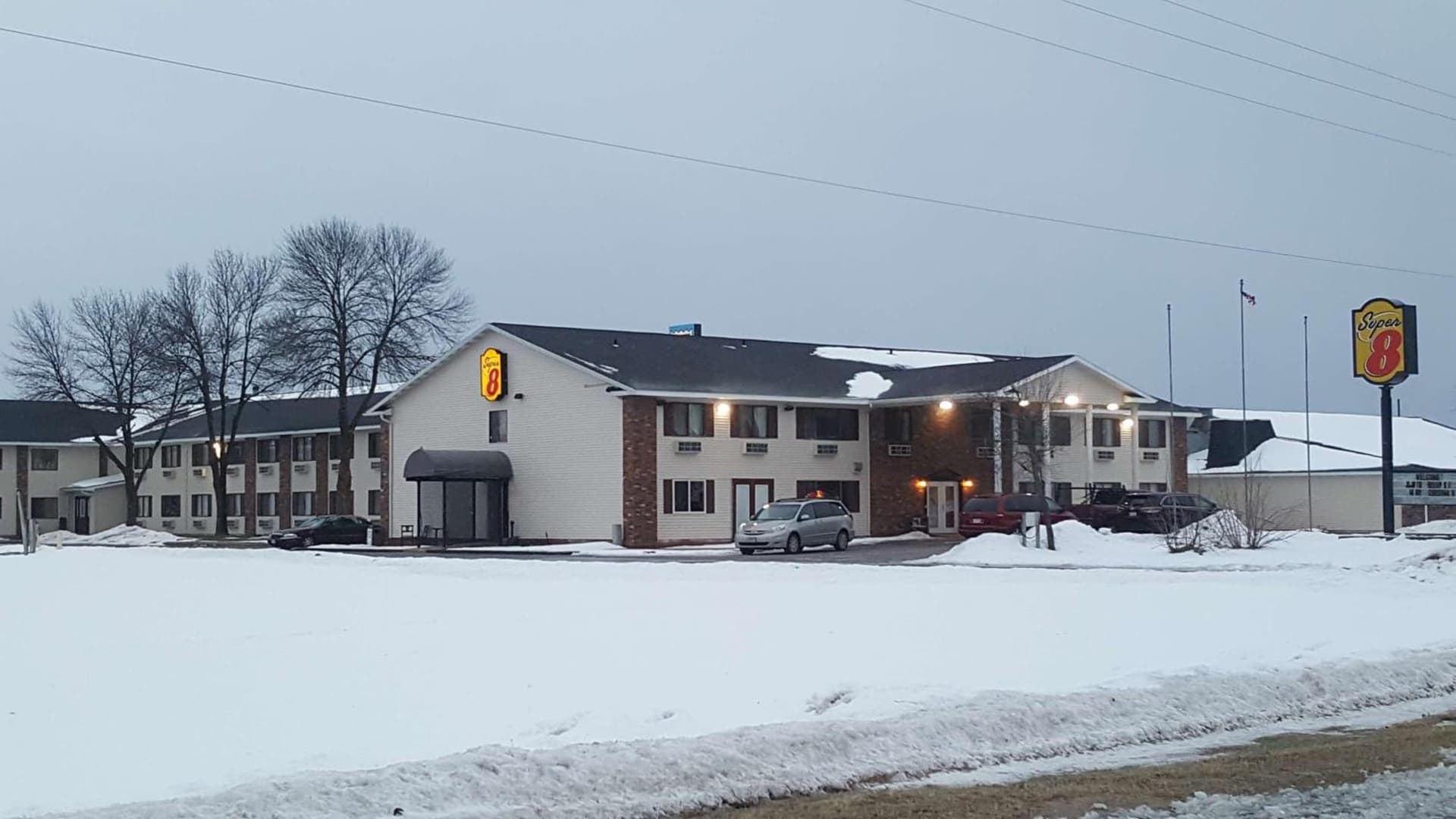 Super 8 by Wyndham Plover Stevens Point Area featured exterior or lobby in Plover, WI — similar hotel