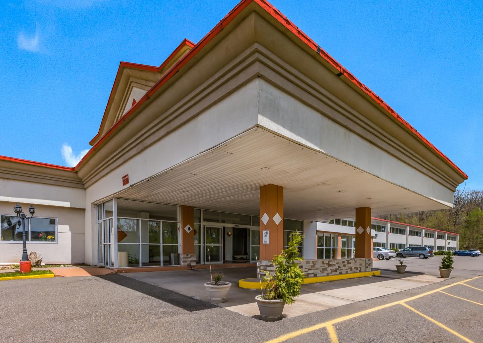Red Carpet Inn & Suites featured exterior or lobby in Hazleton, PA — similar hotel