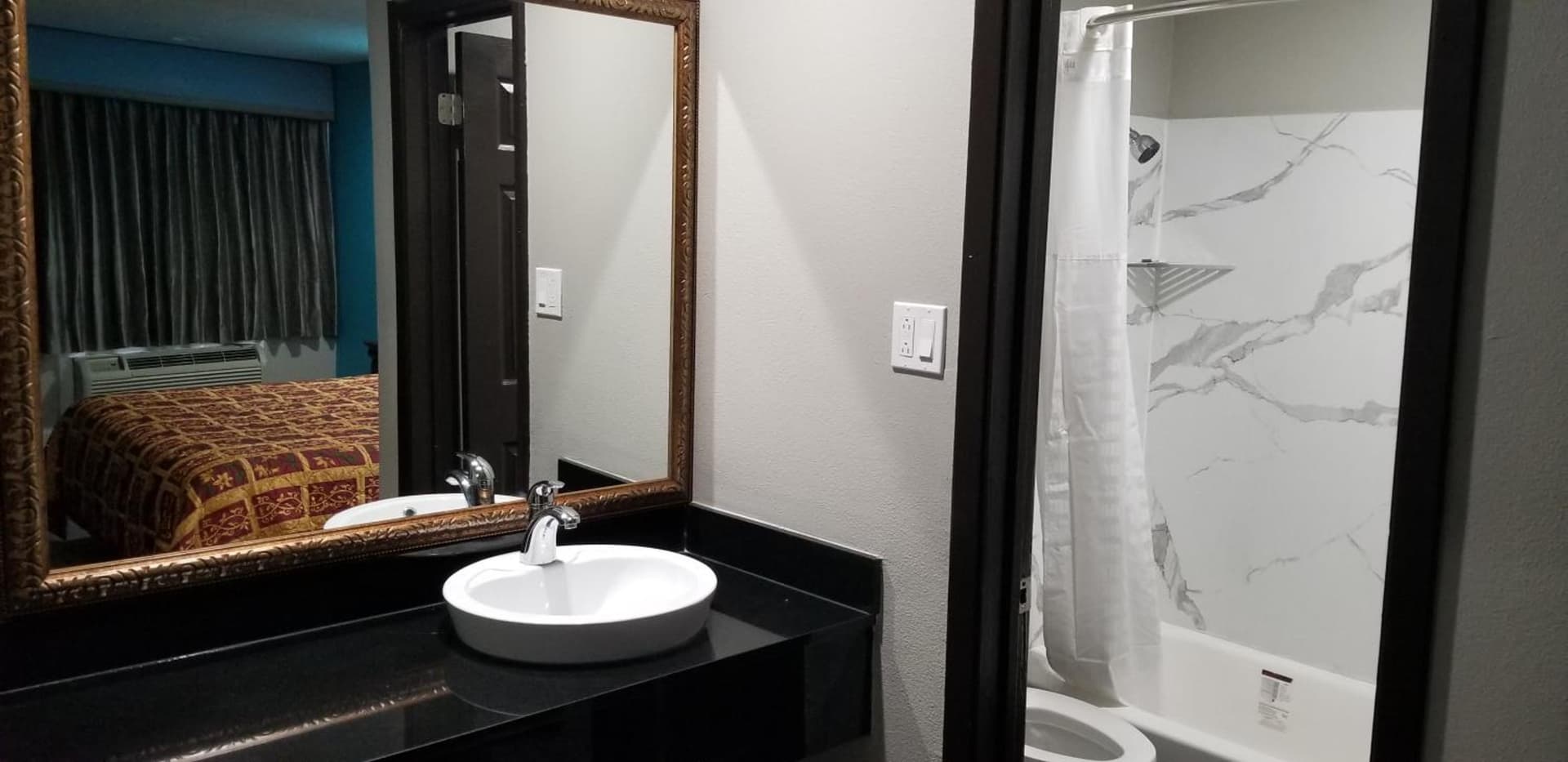 Delux Inn Mesquite interior in Mesquite, TX — gallery photo 2