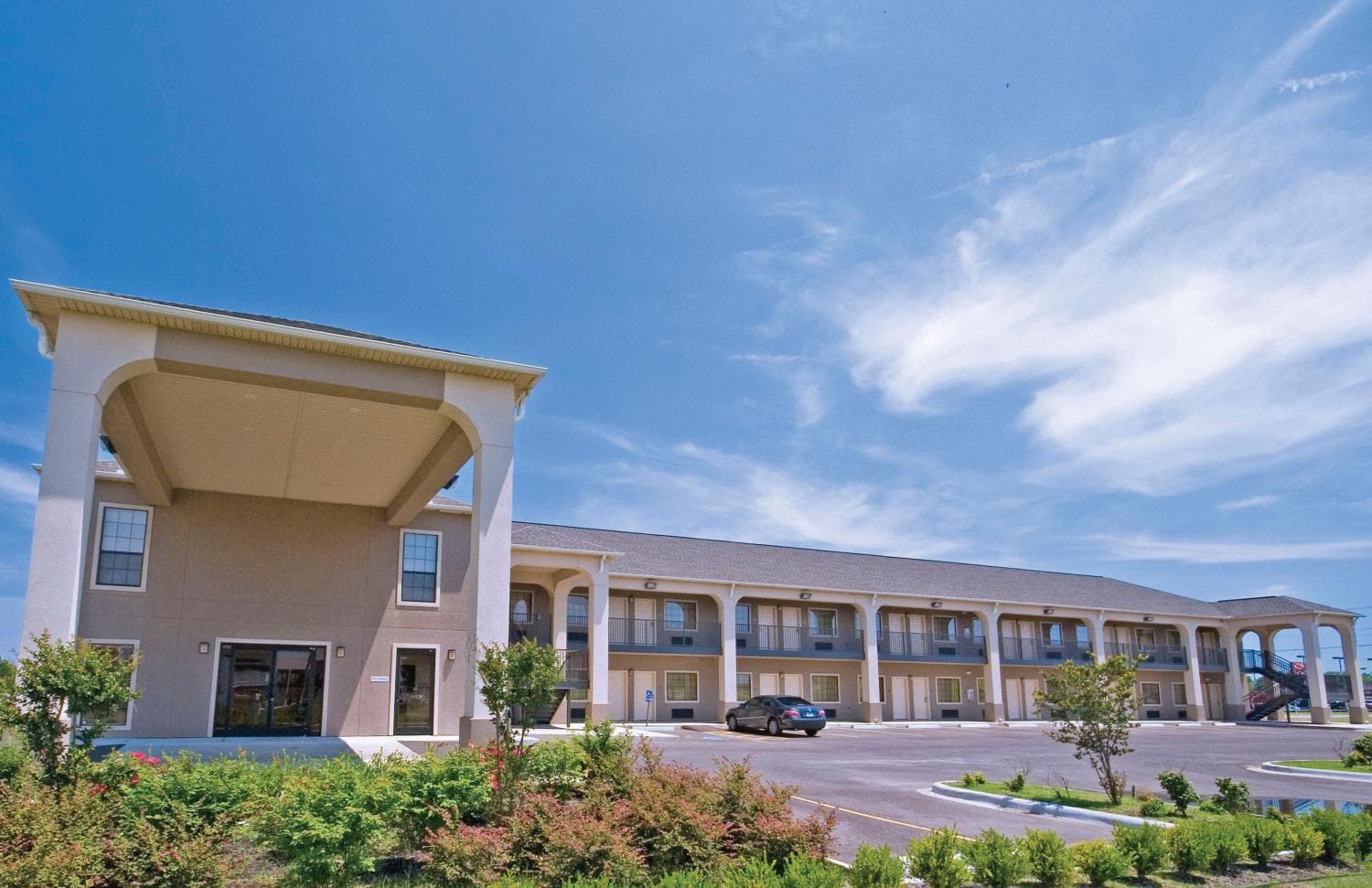 Homegate Inn & Suites West Memphis featured exterior or lobby in West Memphis, AR — similar hotel