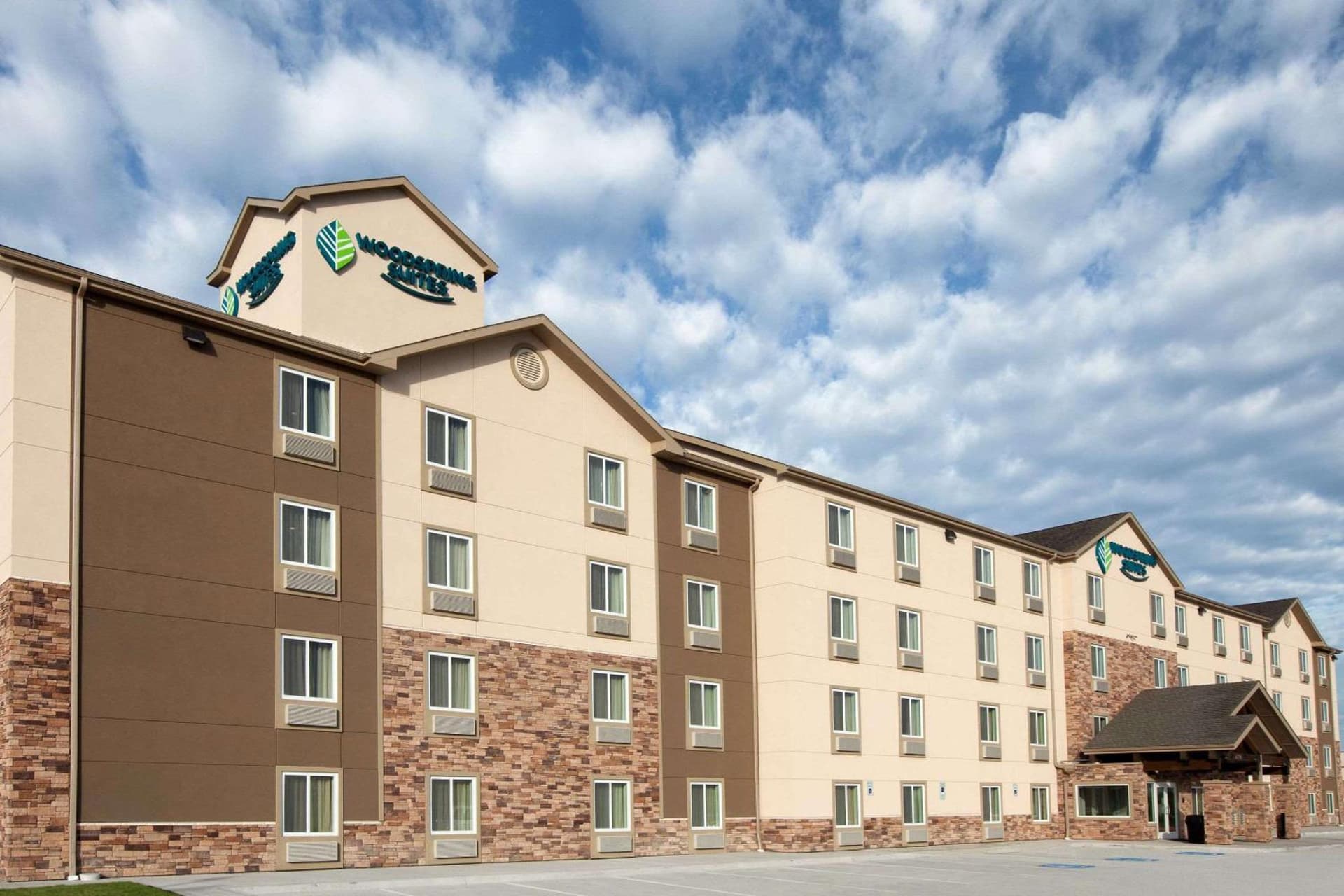 WoodSpring Suites Plano - North Dallas featured exterior or lobby in Plano, TX — similar hotel