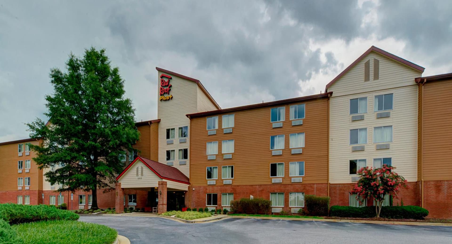 Red Roof Inn PLUS Raleigh Downtown NCSU Conv Center featured exterior or lobby in Raleigh, NC — similar hotel