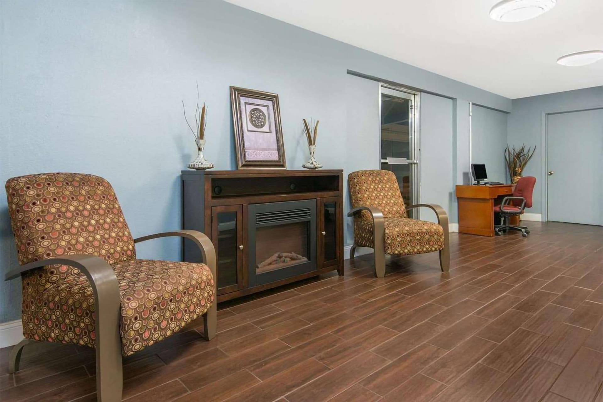 Blue Way Inn & Suites Wichita East featured exterior or lobby in Wichita, KS — similar hotel