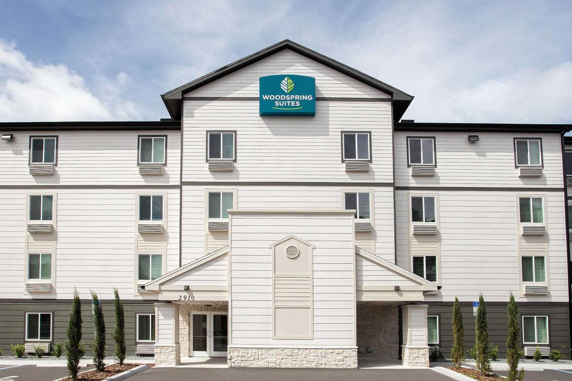 WoodSpring Suites Daytona Beach Int'l Speedway featured exterior or lobby in Daytona Beach, FL — similar hotel