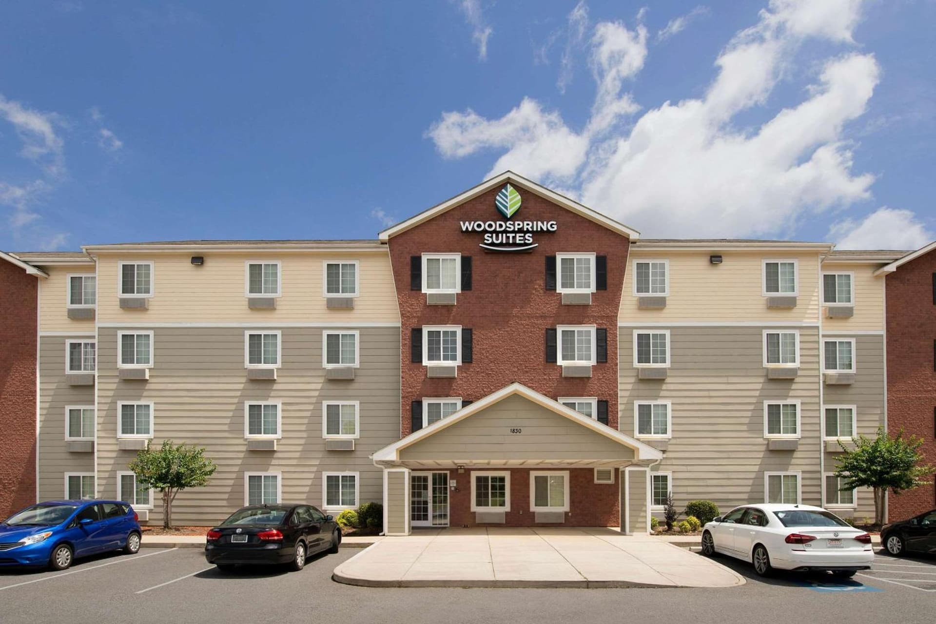 WoodSpring Suites Charlotte Gastonia featured exterior or lobby in Gastonia, NC — similar hotel