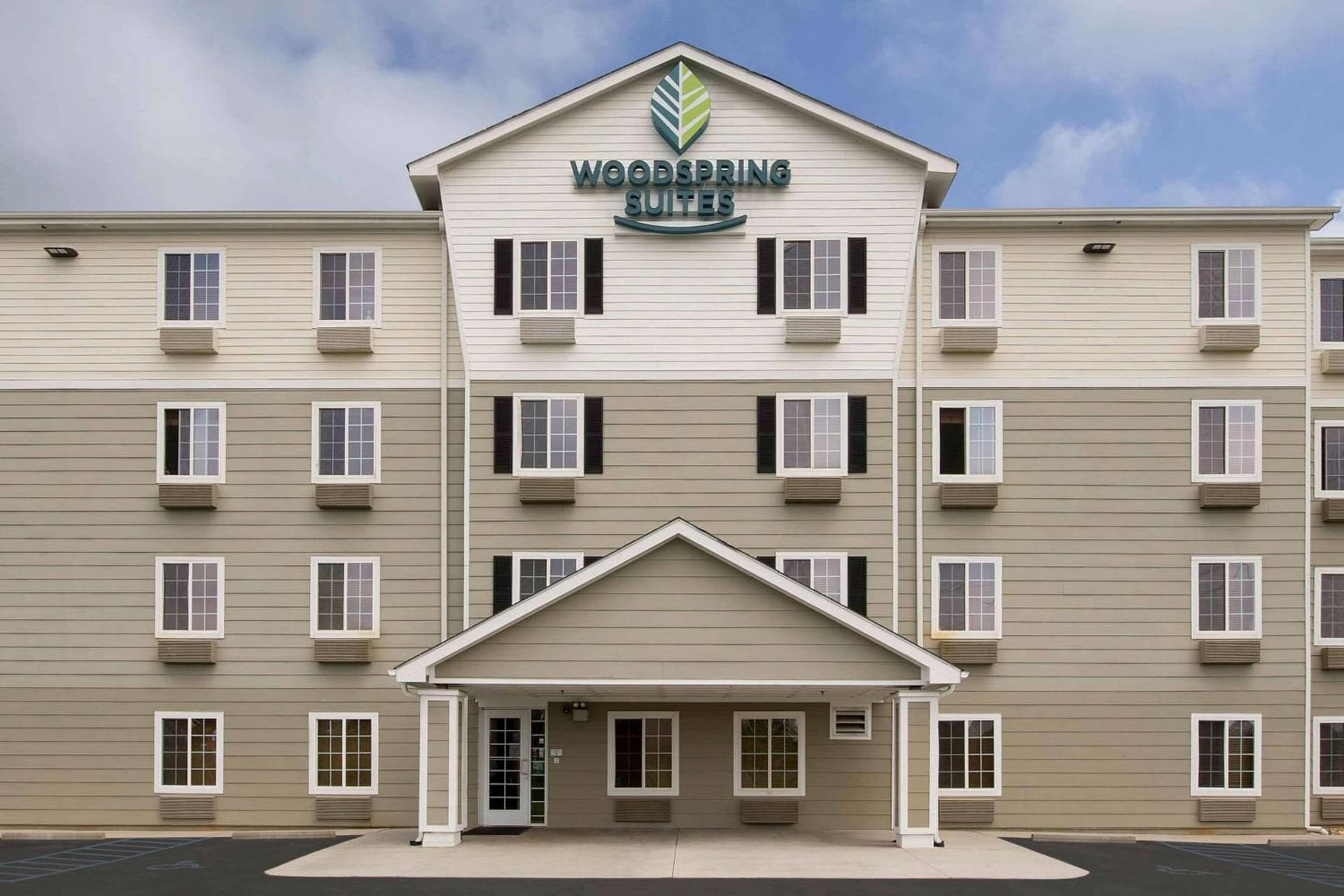 WoodSpring Suites Greenville Central I-85 featured exterior or lobby in Greenville, SC — similar hotel
