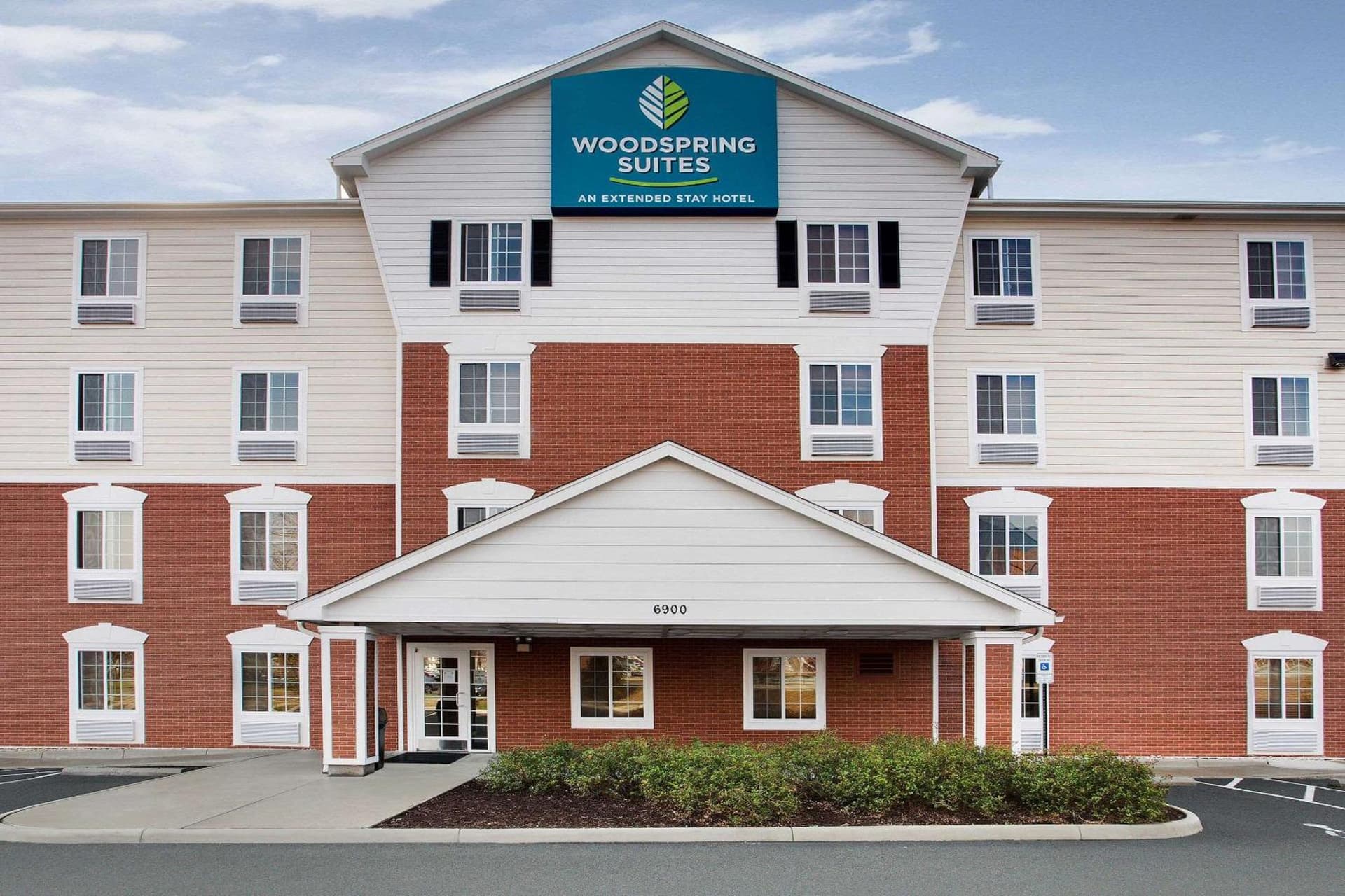 WoodSpring Suites Richmond West I-64 featured exterior or lobby in Richmond, VA — similar hotel