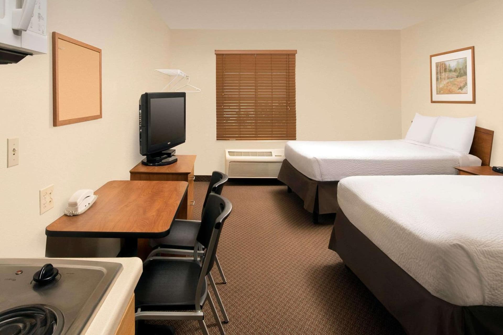 WoodSpring Suites Midland interior in Midland, TX — gallery photo 2