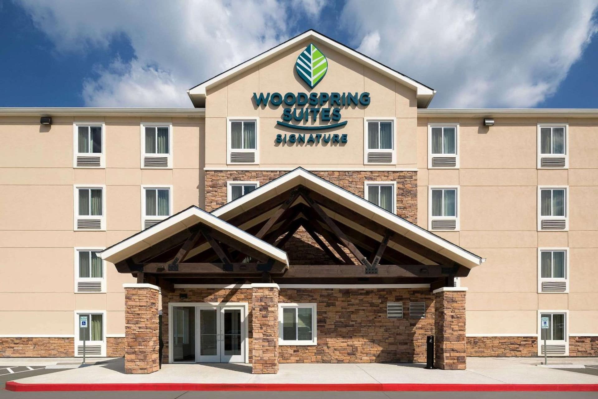 Woodspring Suites Houston IAH Airport featured exterior or lobby in Humble, TX — similar hotel