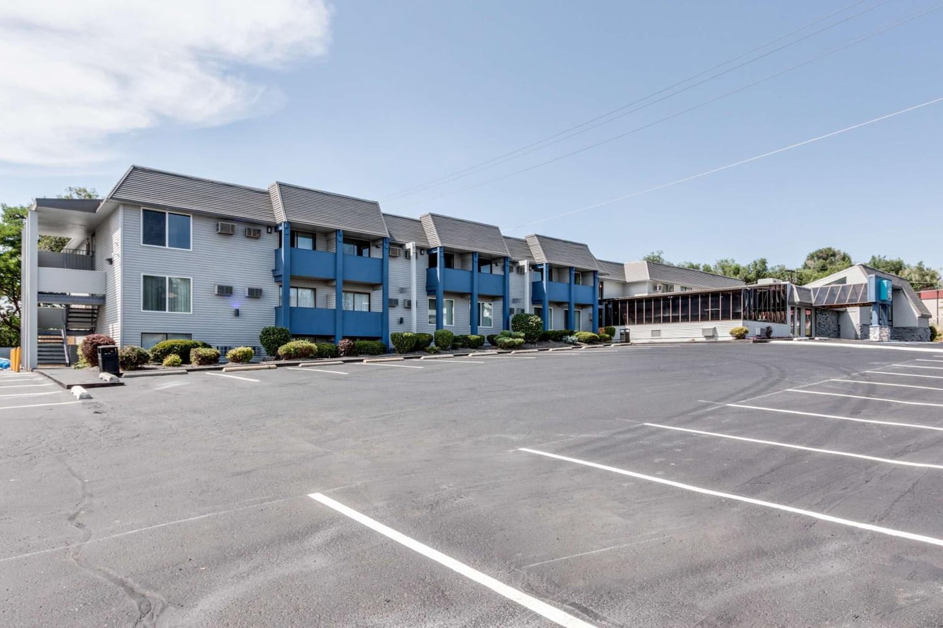 Days Inn & Suites by Wyndham Spokane featured exterior or lobby in Spokane, WA — similar hotel