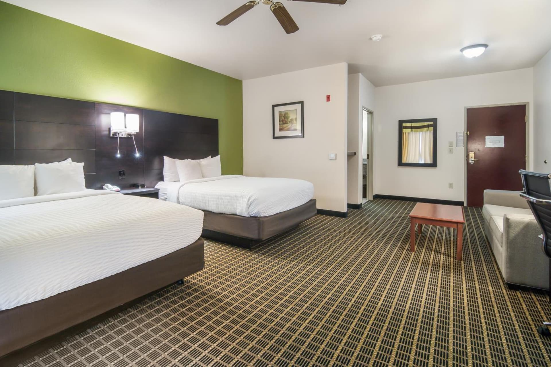 Clarion Inn & Suites Weatherford South interior in Weatherford, TX — gallery photo 2