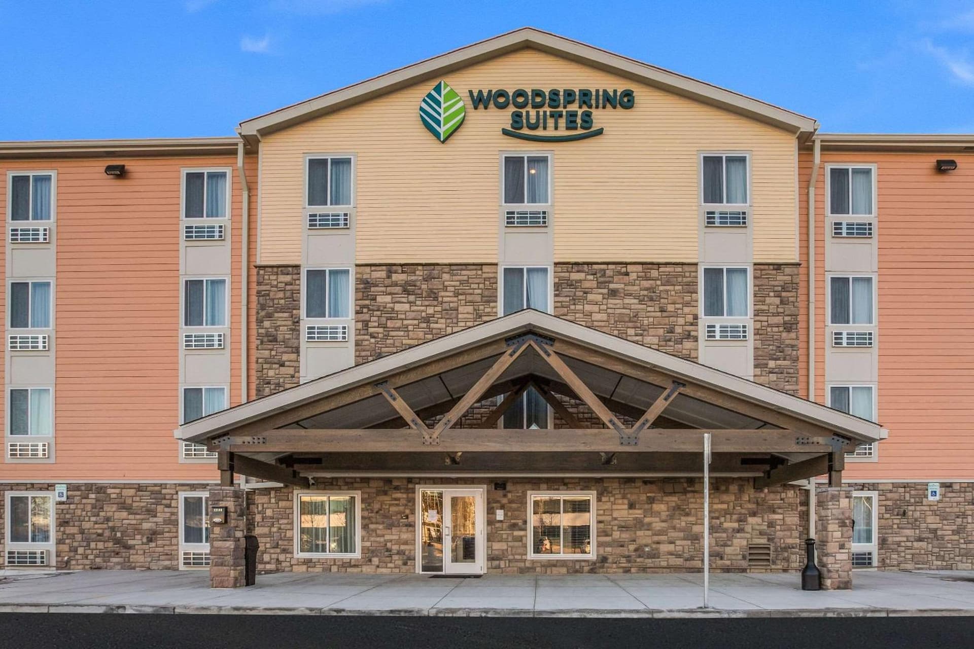 WoodSpring Suites Novi Farmington featured exterior or lobby in Farmington Hills, MI — similar hotel