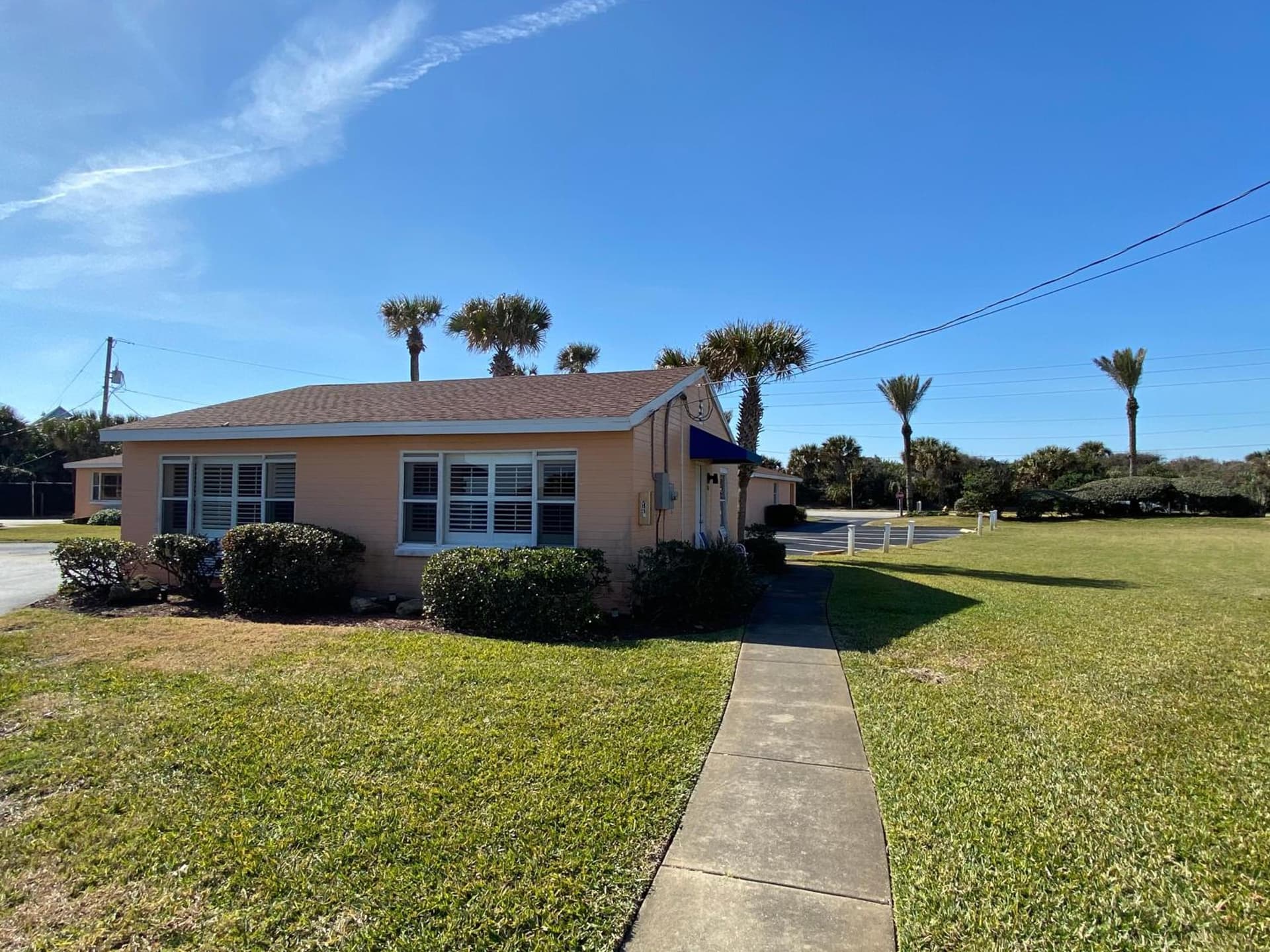 Coral Sands Inn exterior or lobby in Ormond Beach, FL — main listing photo