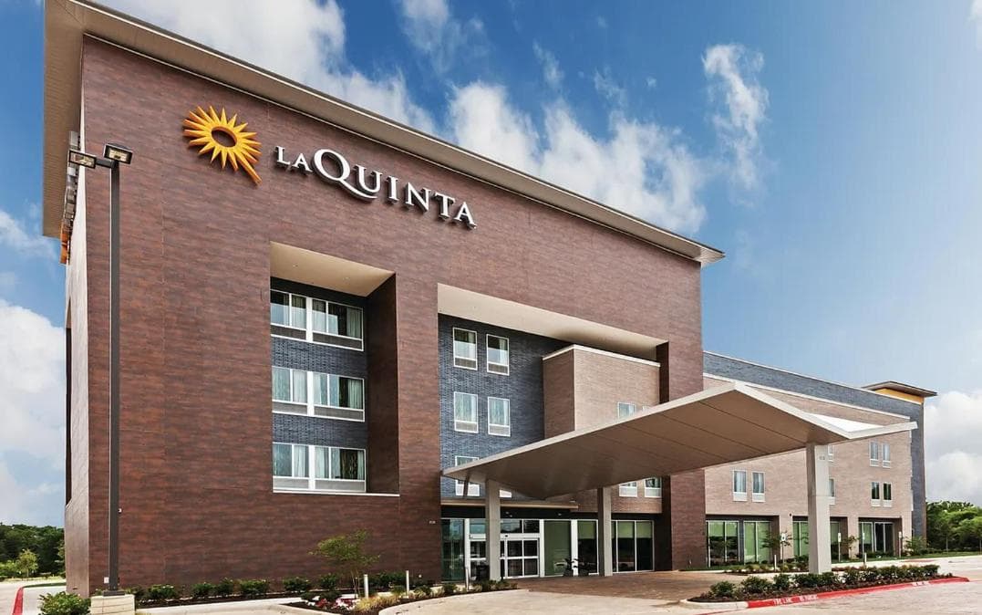 La Quinta Inn & Suites by Wyndham Louisville NE - Old Henry Rd featured exterior or lobby in Louisville, KY — similar hotel
