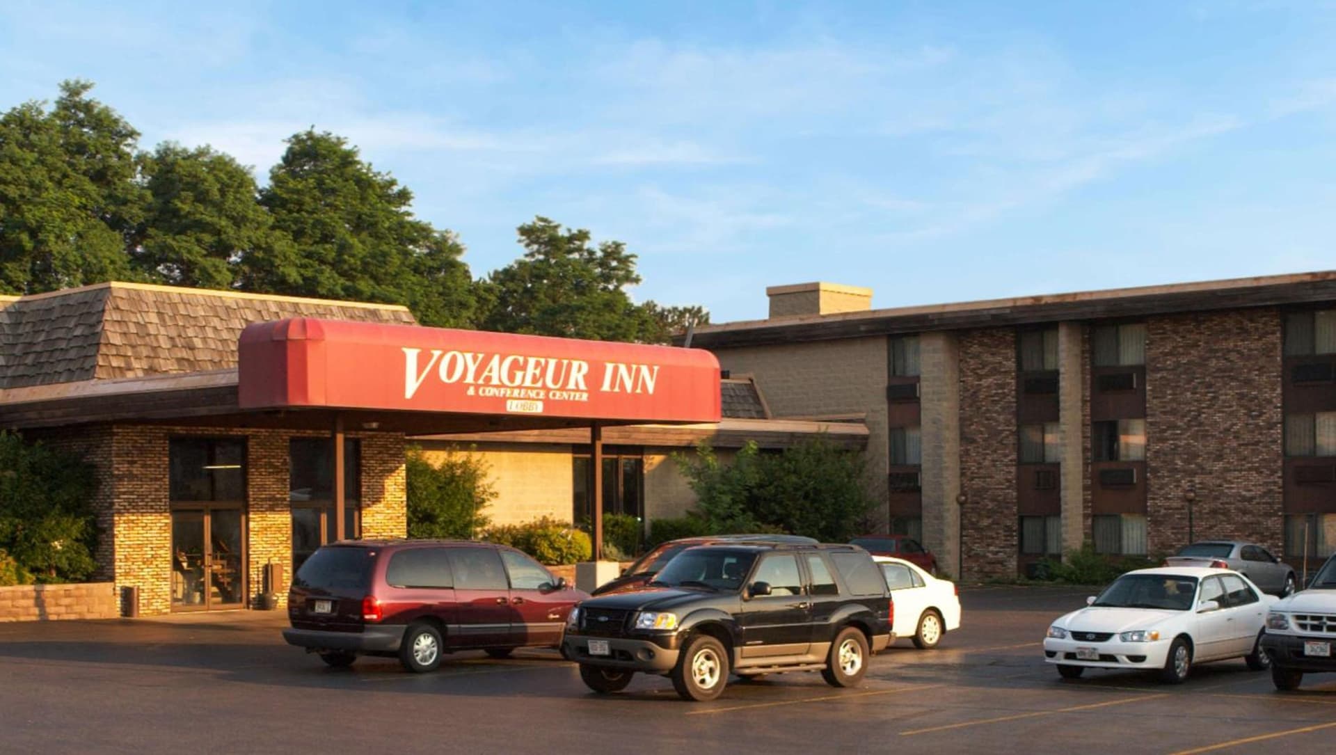 Voyageur Inn and Conference Center featured exterior or lobby in Reedsburg, WI — similar hotel