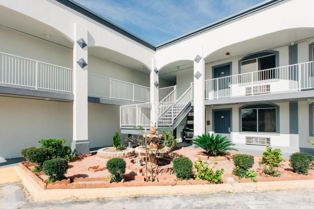 Space City Inn exterior or lobby in Houston, TX — main listing photo