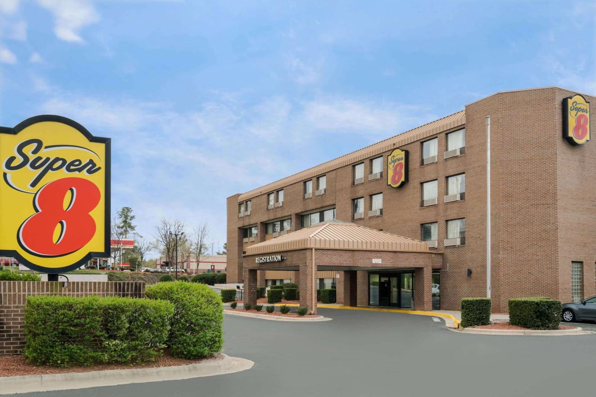 Super 8 by Wyndham Raleigh North East featured exterior or lobby in Raleigh, NC — similar hotel