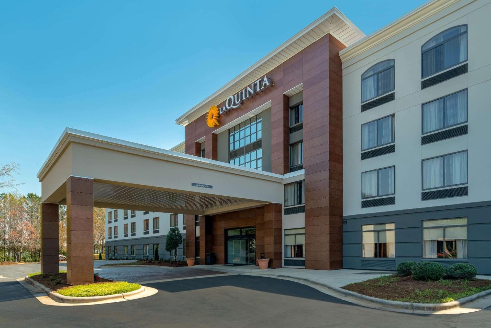 La Quinta by Wyndham Raleigh Downtown North featured exterior or lobby in Raleigh, NC — similar hotel