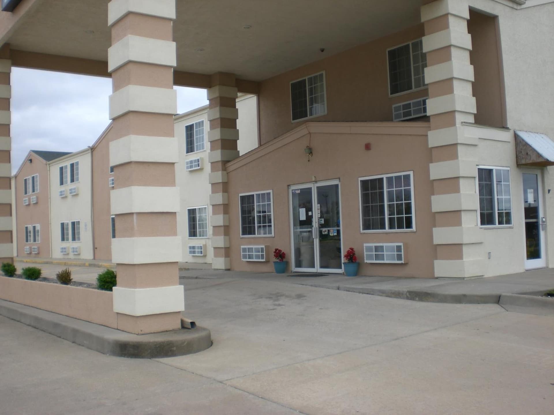 Days Inn by Wyndham Butler featured exterior or lobby in Butler, MO — similar hotel