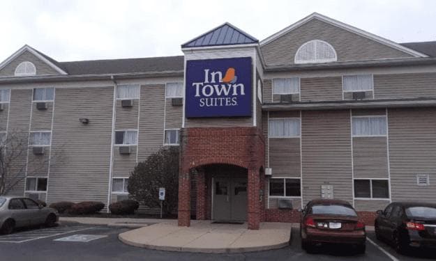 InTown Suites Extended Stay Minneapolis MN - Coon Rapids featured exterior or lobby in Coon Rapids, MN — similar hotel