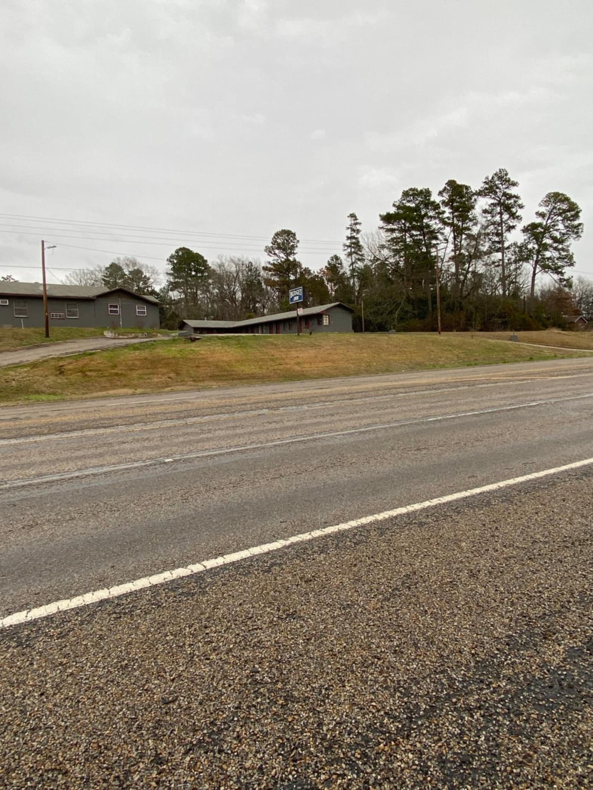 Budget Inn featured exterior or lobby in Mineola, TX — similar hotel