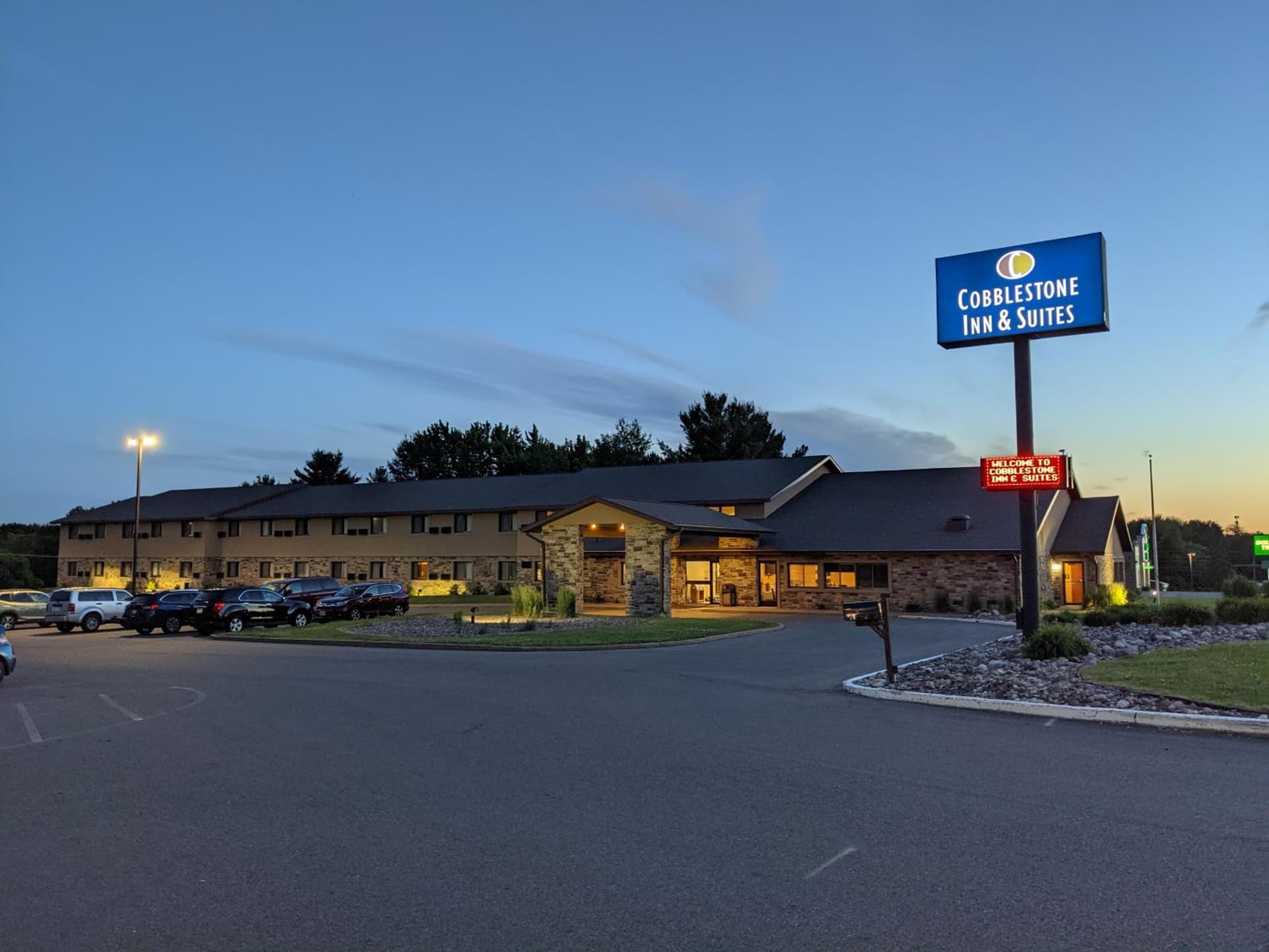Cobblestone Inn & Suites - Merrill featured exterior or lobby in Merrill, WI — similar hotel