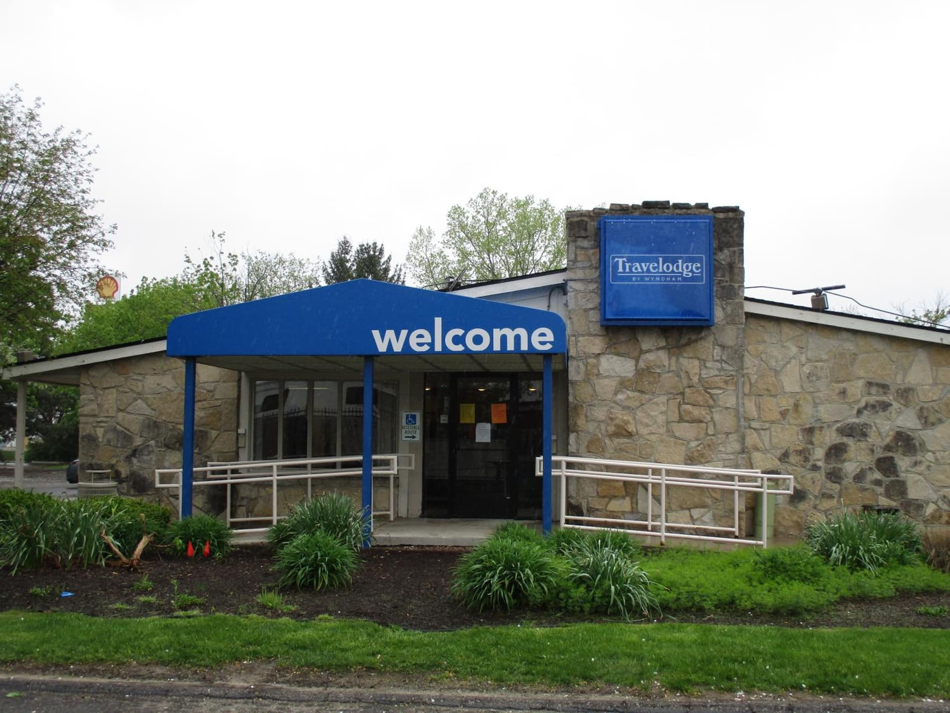 Travelodge by Wyndham Lansing featured exterior or lobby in Lansing, MI — similar hotel