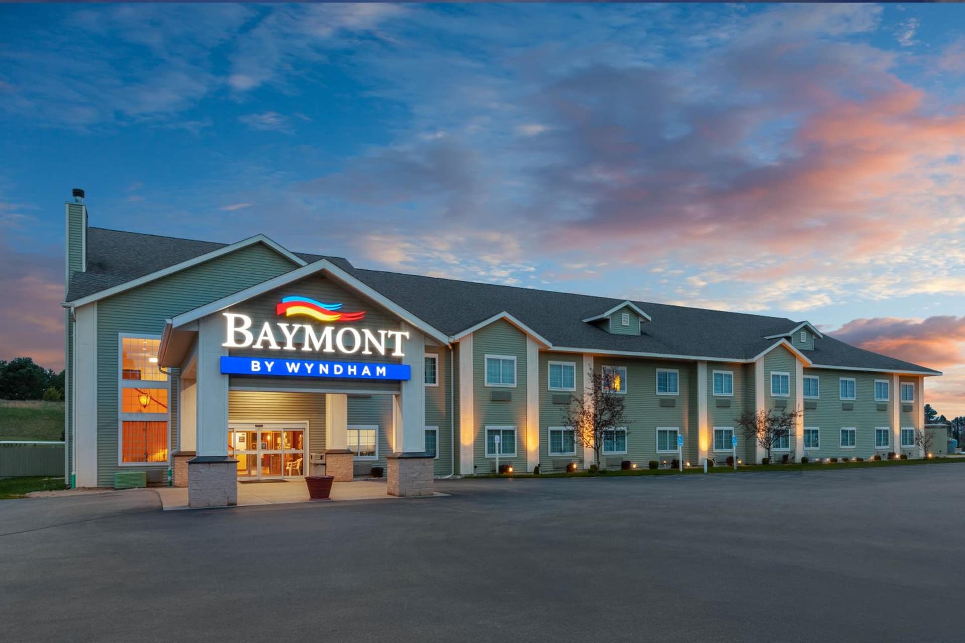 Baymont by Wyndham Beulah featured exterior or lobby in Beulah, MI — similar hotel