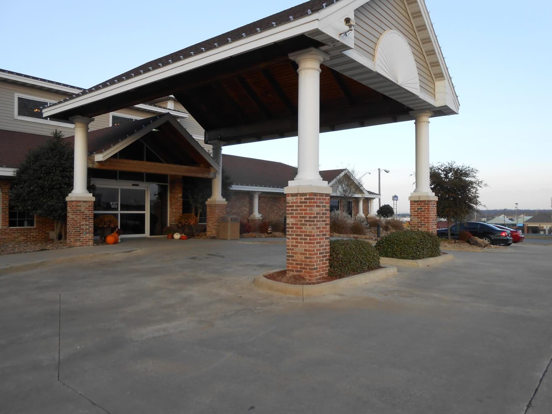 AmericInn by Wyndham McAlester featured exterior or lobby in McAlester, OK — similar hotel