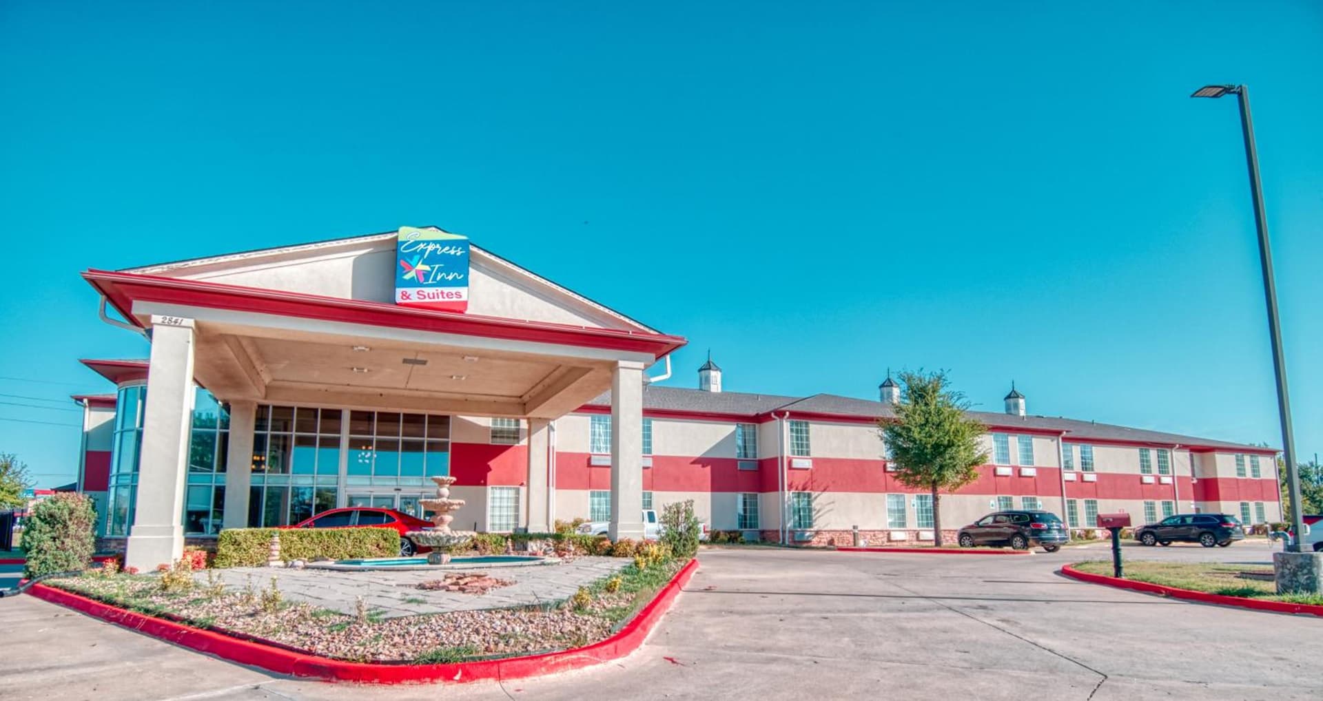 Express inn & suites featured exterior or lobby in Norman, OK — similar hotel