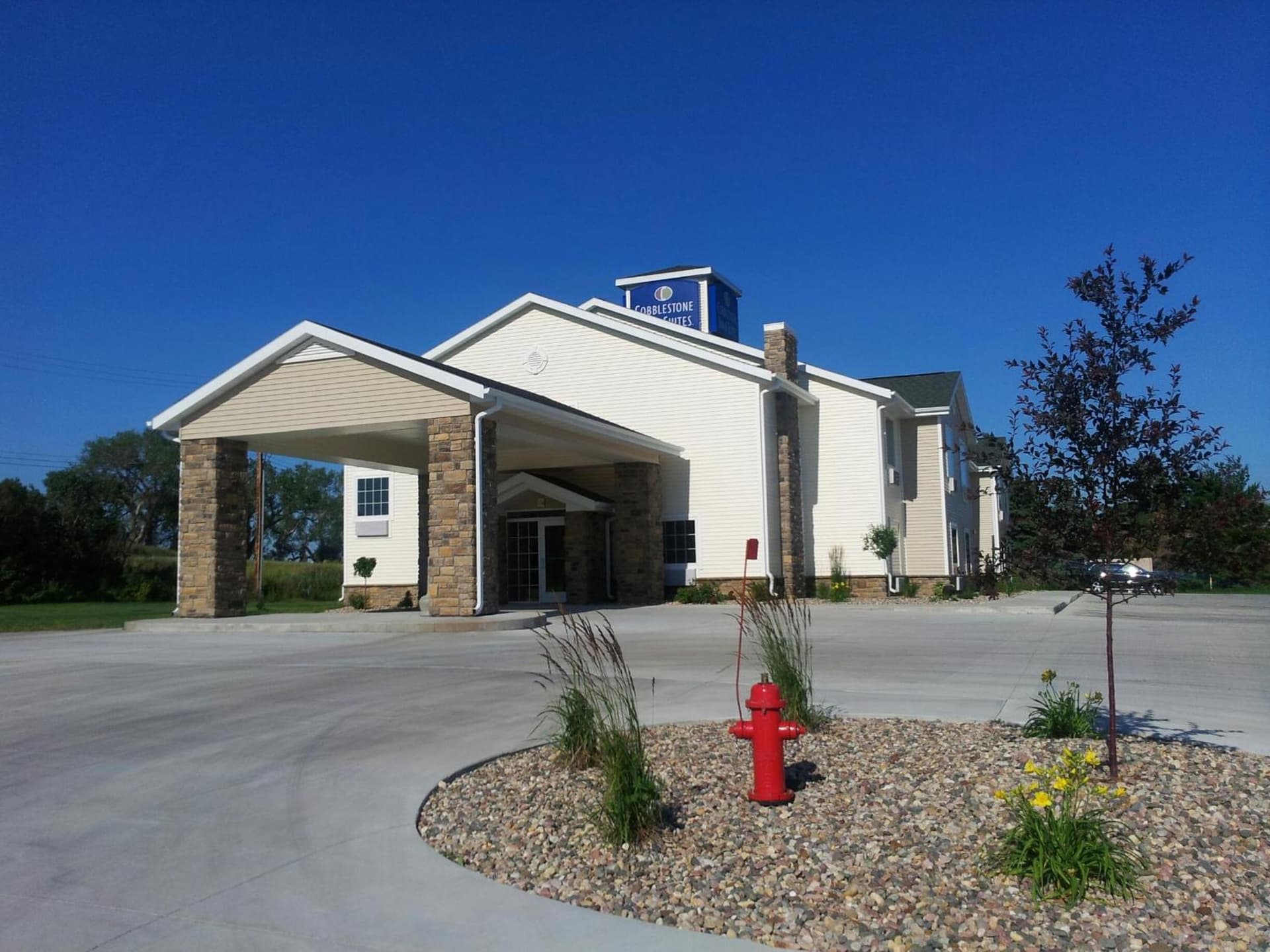 Cobblestone Inn & Suites - Hartington featured exterior or lobby in Hartington, NE — similar hotel