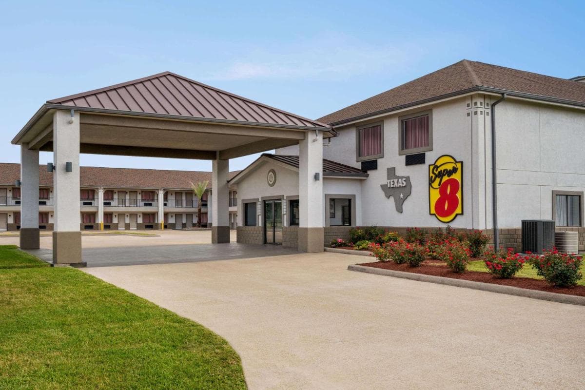 Super 8 by Wyndham Houston/Dtwn/I-610 featured exterior or lobby in Houston, TX — similar hotel