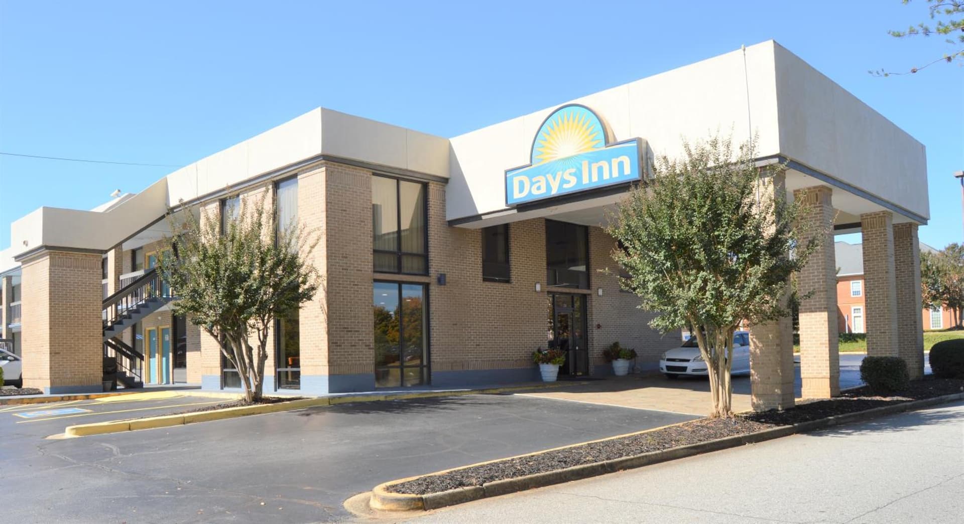 Days Inn by Wyndham Easley West Of Greenville/Clemson Area featured exterior or lobby in Easley, SC — similar hotel