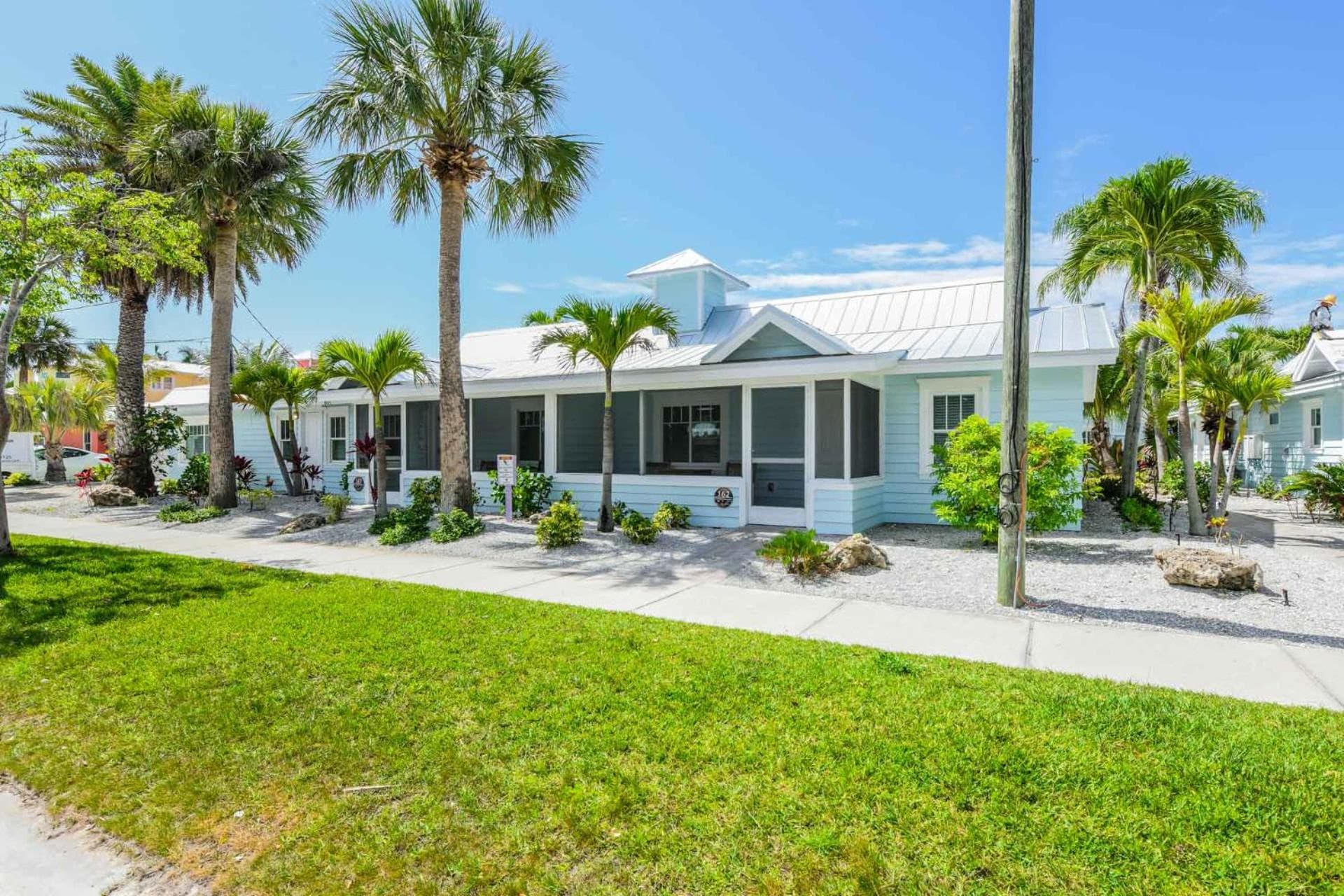 Tropical Breeze Resort exterior or lobby in Sarasota, FL — main listing photo