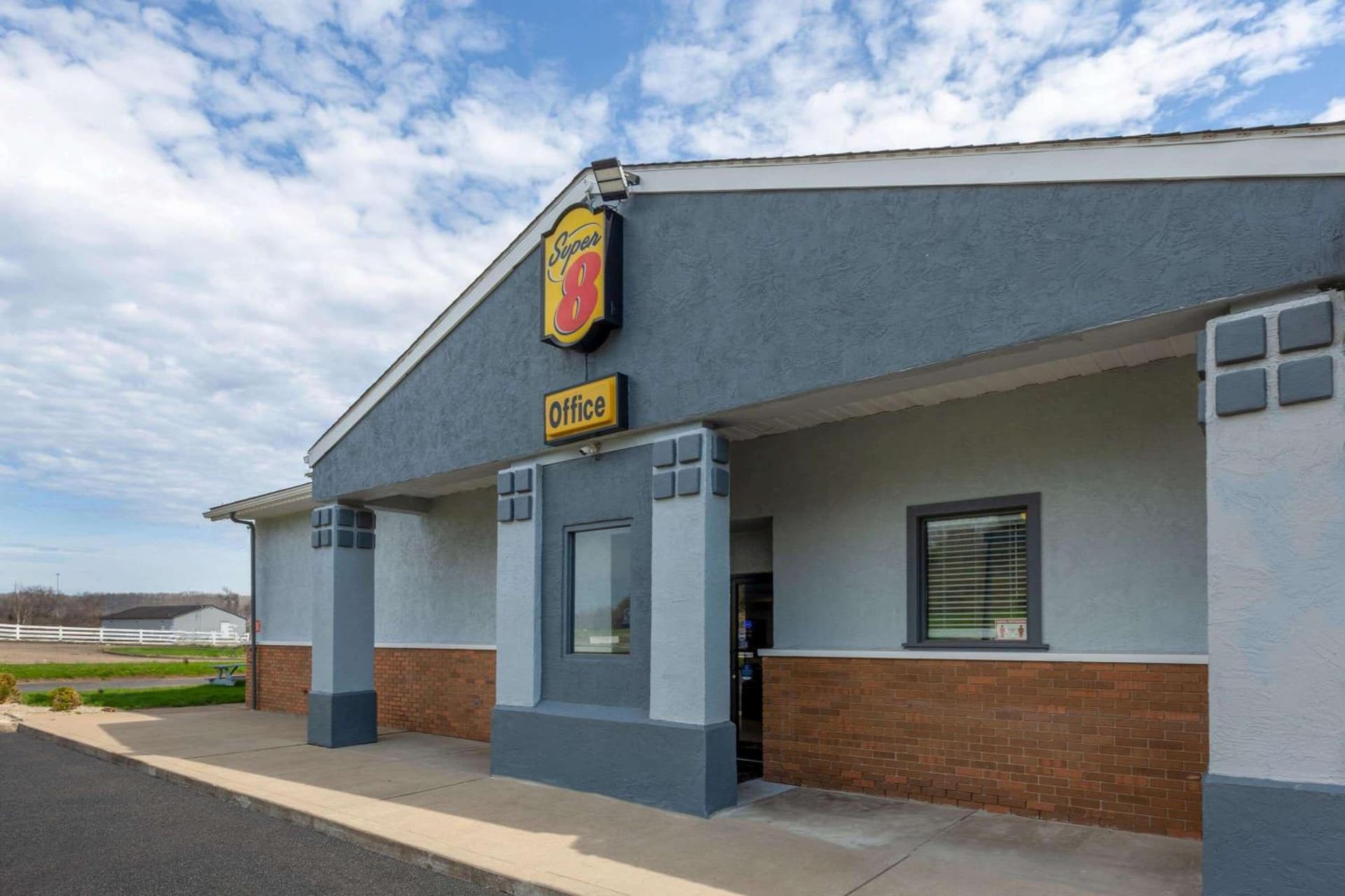 Super 8 by Wyndham Newcomerstown featured exterior or lobby in Newcomerstown, OH — similar hotel