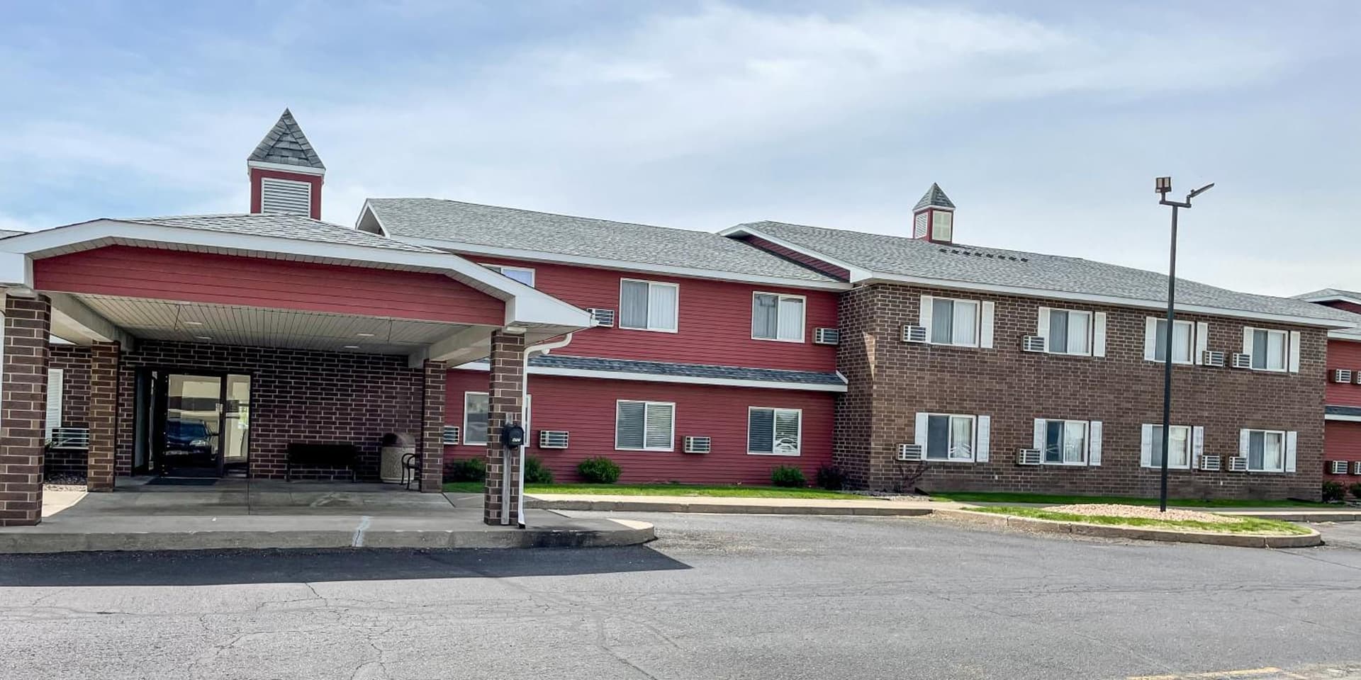 Hudson Inn & Suites featured exterior or lobby in Hudson, WI — similar hotel