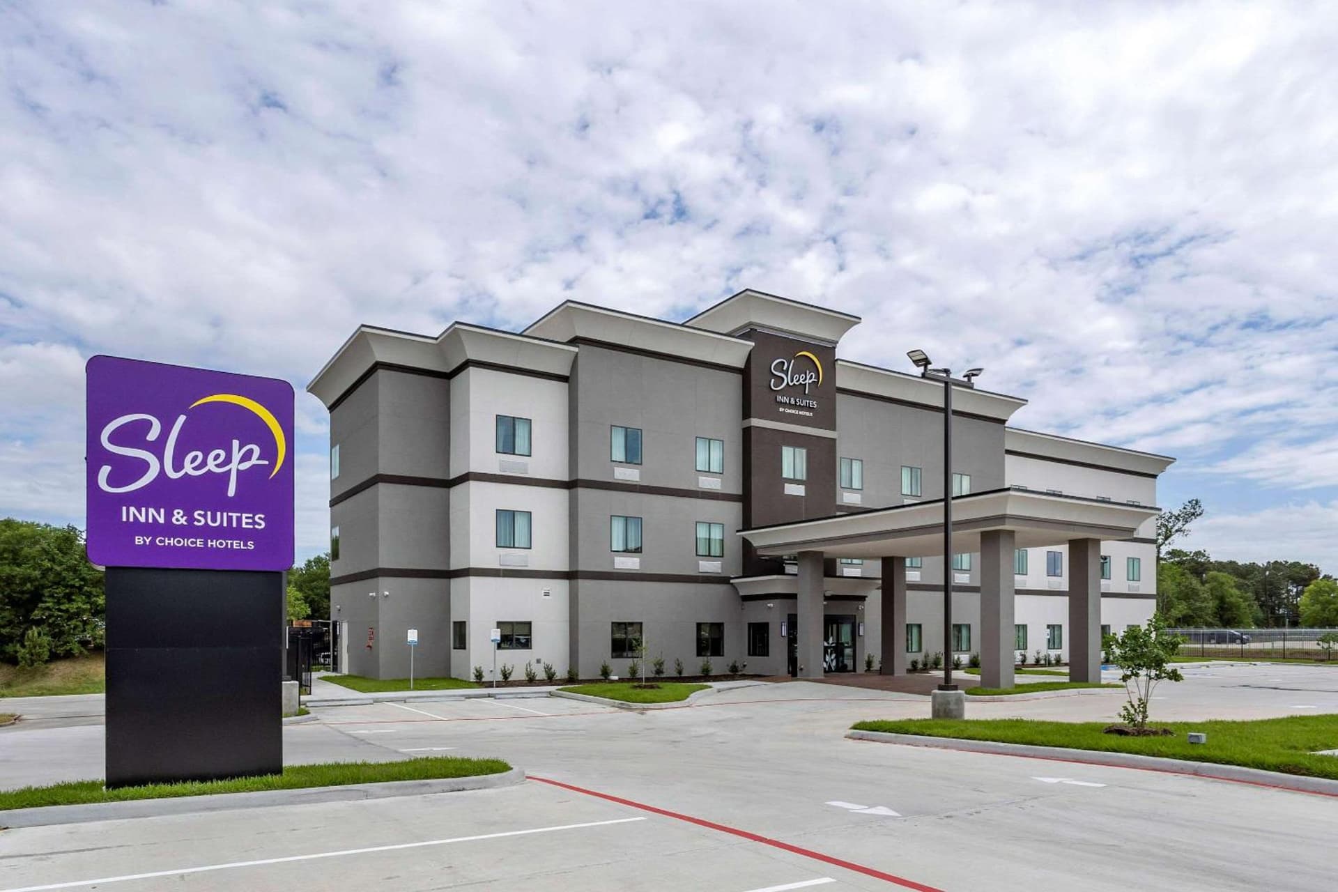 Redwood inn & Suites Crosby featured exterior or lobby in Crosby, TX — similar hotel